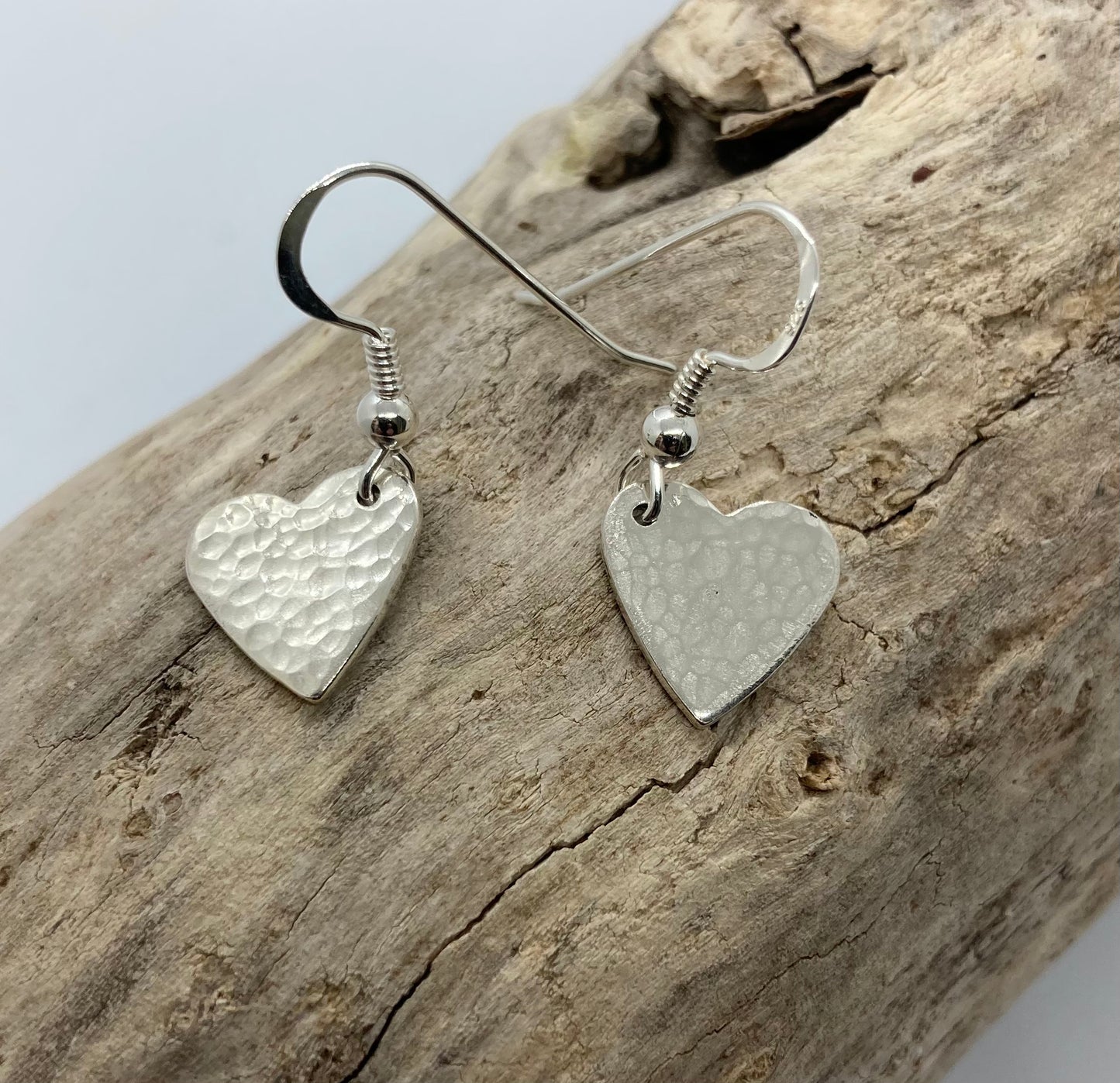 Dimpled heart dangle earrings