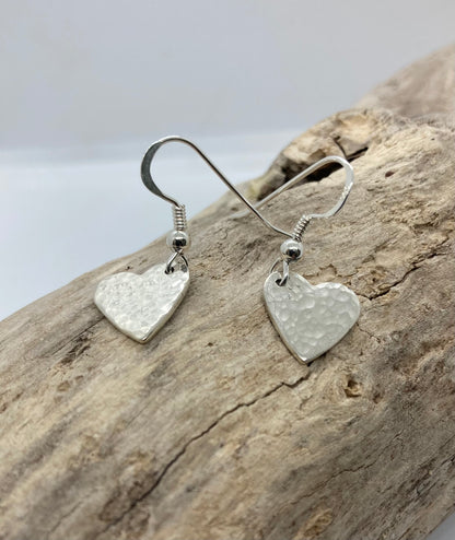 Dimpled heart dangle earrings