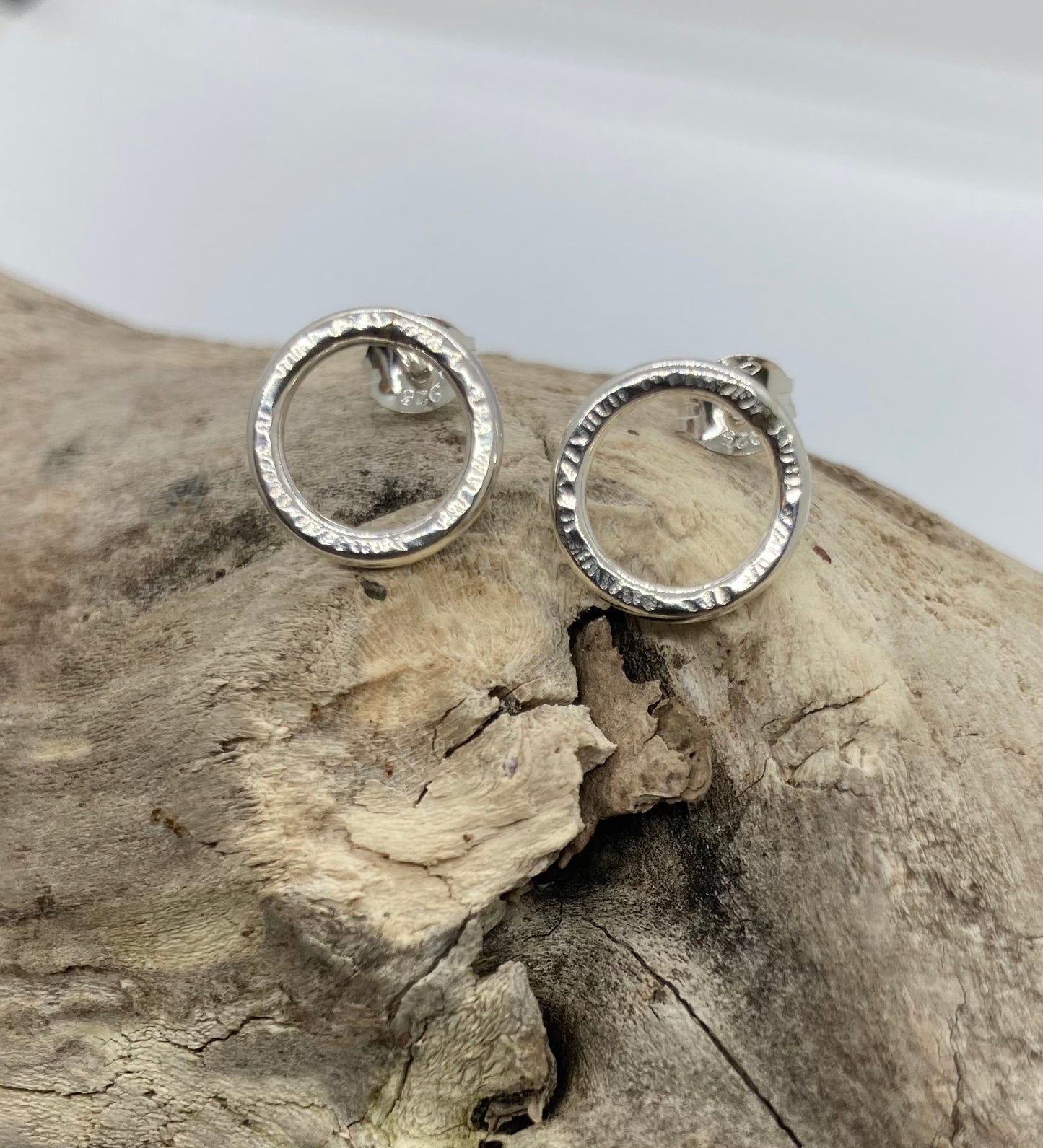 Lined textured open circle studs