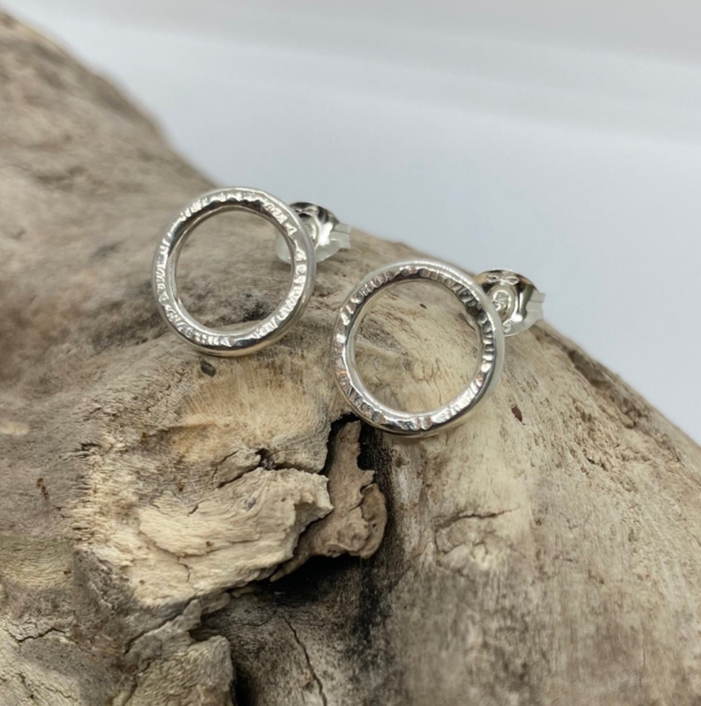 Lined textured open circle studs